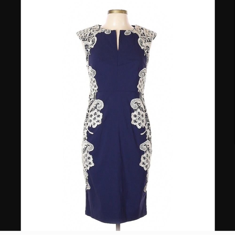 NWT paper doll navy dress with lace detail. Very flattering
